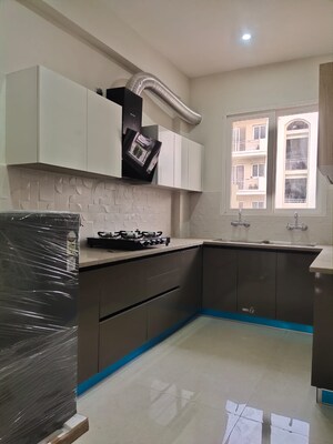 Kitchen in 3 BHK Builder Floor at Prem Satyam Swastik Apartment, Patiala Road – for Sale