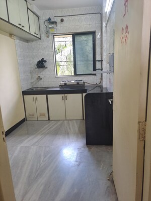 Kitchen in 2 BHK Apartment at Shiv Shrushti CHS, Bhandup West – for Rent