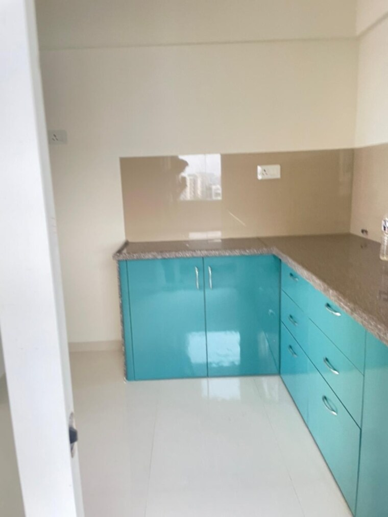 Kitchen, adi-w-57 2 Bedroom 747 Sq.Ft. Apartment In Wakad Pune 9383176