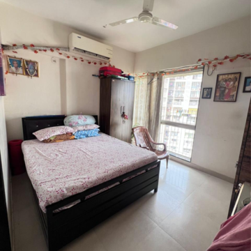 Bedroom in 1.5 BHK Apartment at Amal Aspen Park, Sonawala Industry Estate – for Sale