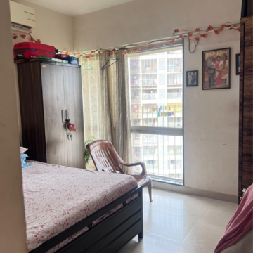 Bedroom in 1.5 BHK Apartment at Amal Aspen Park, Sonawala Industry Estate – for Sale