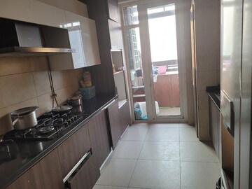 Kitchen in 3 BHK Apartment at Mahindra Luminare, Sector 59 – for Sale