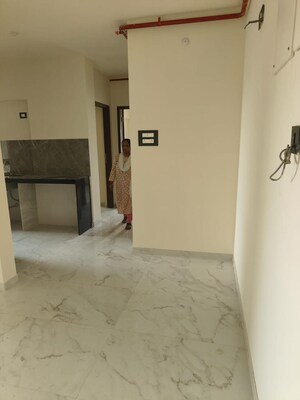 Room in 2 BHK Apartment at Oshiwara Aster CHS Ltd, Andheri West – for Sale