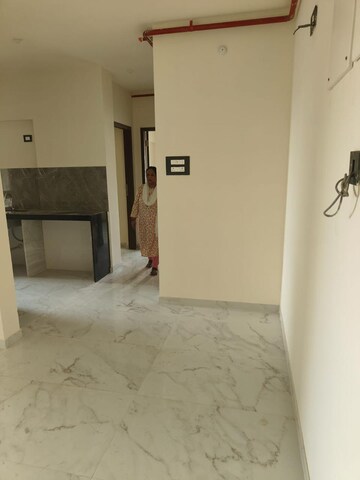 Room in 2 BHK Apartment at Oshiwara Aster CHS Ltd, Andheri West – for Sale