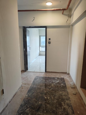Room in 2 BHK Apartment at Oshiwara Aster CHS Ltd, Andheri West – for Sale