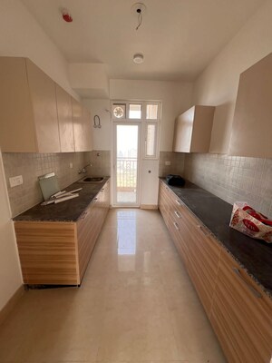 Kitchen in 3 BHK Apartment at ATS Homekraft Pious Hideaways, Sector 150 – for Rent