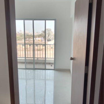 Room in 2 BHK Apartment at Saheel Itrend Life, Mumbai Bangalore Highway – for Sale
