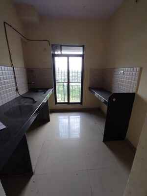 Kitchen in 1 BHK Apartment at Squarefeet Imperial Square, Ghodbunder Road – for Rent