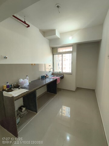 Kitchen in 1 BHK Apartment at Puranik Tokyo Bay Phase 2A, Kasarvadavali – for Rent