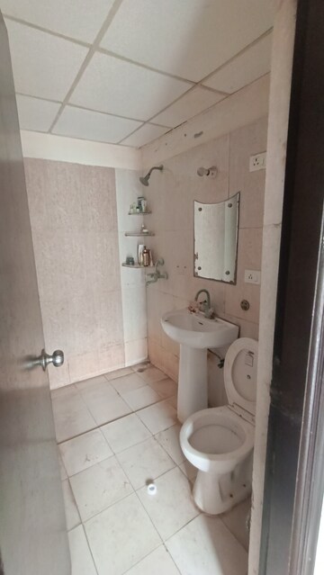 Bathroom in 2 BHK Apartment at Antriksh Golf View, Sector 78 – for Rent