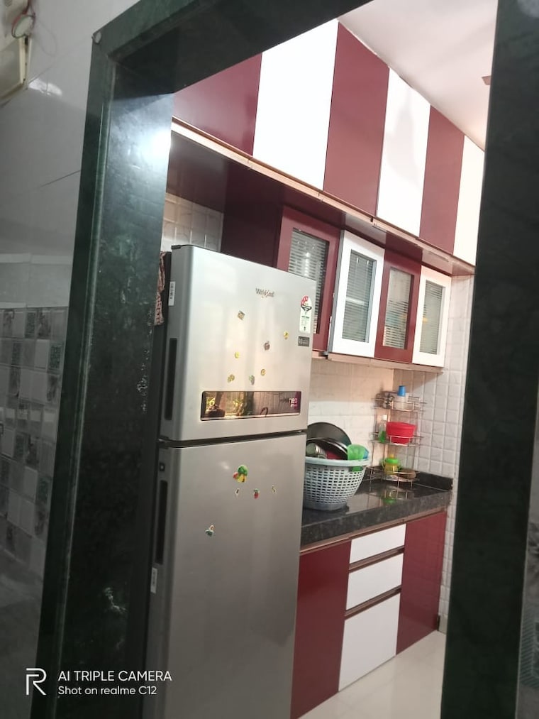 Kitchen, dosti-planet-north-opal 1.5 Bedroom 850 Sq.Ft. Apartment In Shilphata Thane 9383659