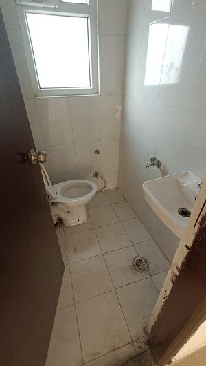 Bathroom in 2 BHK Apartment at Antriksh Golf View, Sector 78 – for Rent