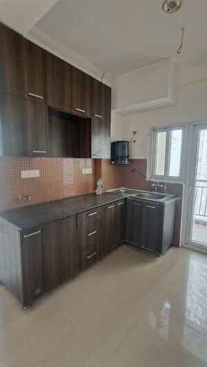 Kitchen in 2 BHK Apartment at Antriksh Golf View, Sector 78 – for Rent