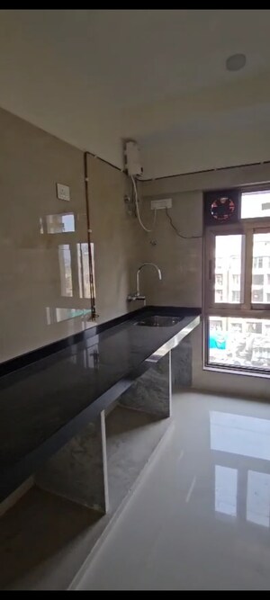Kitchen in 1 BHK Apartment at Jeevan Tara CHS, Vile Parle East – for Rent