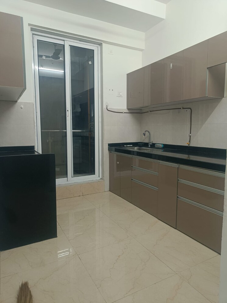Kitchen, rosa-manhattan 2 Bedroom 754 Sq.Ft. Apartment In Ghodbunder Road Thane 9383801