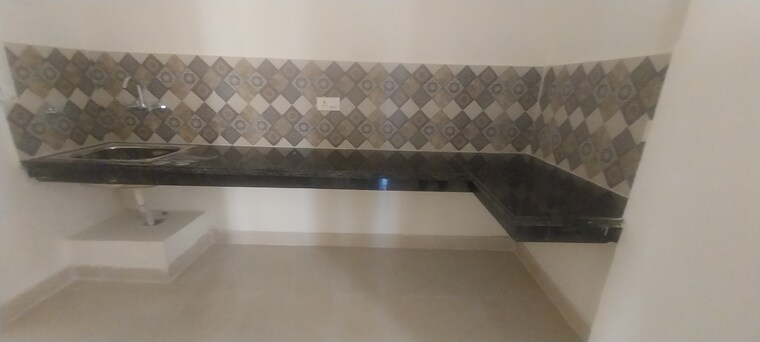 Kitchen, signature-global-the-millennia 2 Bedroom 644 Sq.Ft. Apartment In Sector 37d Gurgaon 9383818