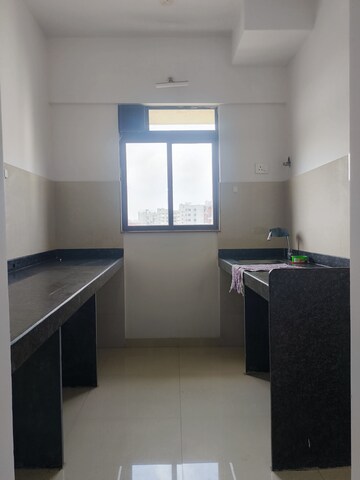 Kitchen in 1 BHK Apartment at Lodha Lakeshore Greens, Dombivli East – for Sale