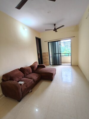 Living Room in 2 BHK Apartment at Parshuram Pride, Ambernath – for Rent