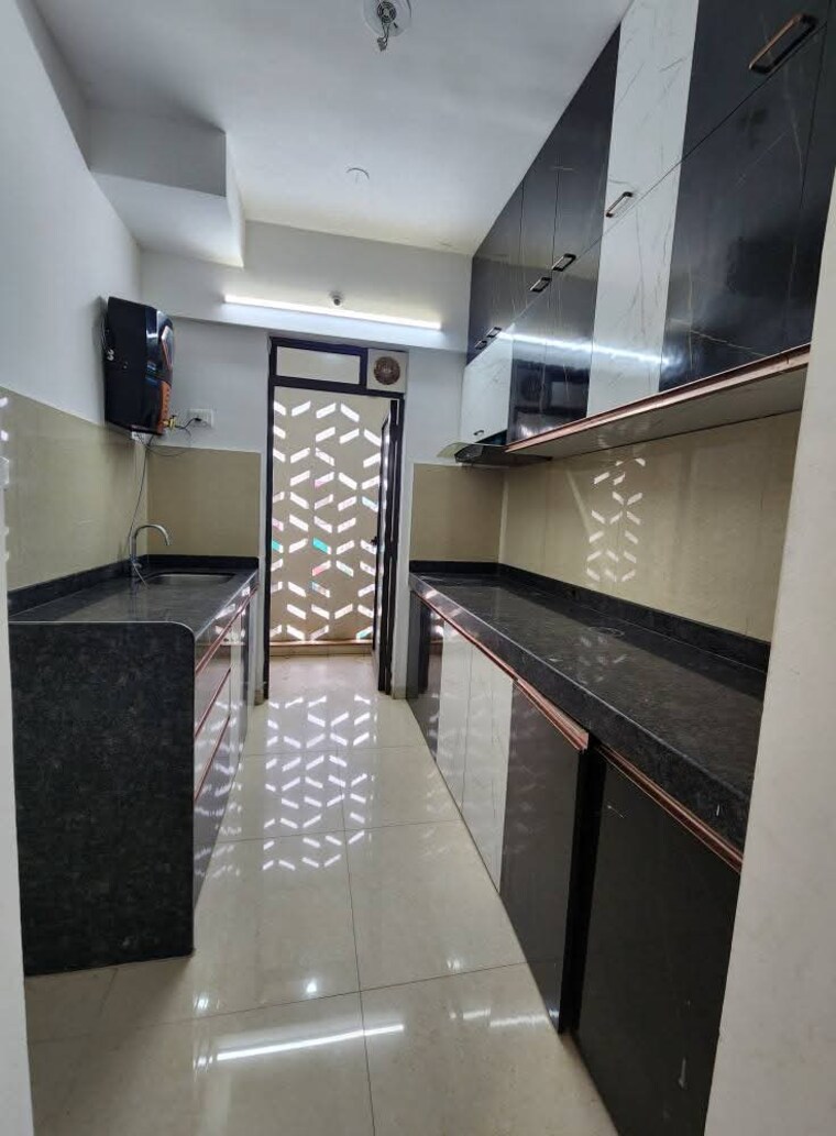 Kitchen, lodha-palava-city-lakeshore-greens 2 Bedroom 618 Sq.Ft. Apartment In Dombivli East Thane 9383939