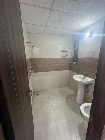 Bathroom in 3 BHK Apartment at Apex Golf Avenue Sports City, Sport City 1 – for Rent