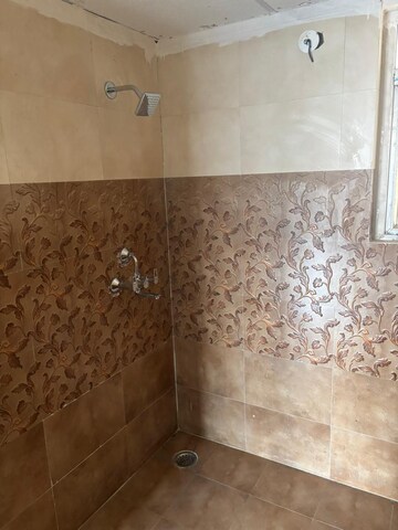 Bathroom in 2.5 BHK Apartment at VVIP Homes, Gaur City 2 – for Rent