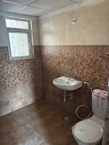Bathroom in 2.5 BHK Apartment at VVIP Homes, Gaur City 2 – for Rent