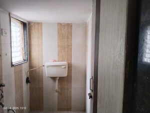 Bathroom in 2 BHK Apartment at Poonam Palash, Nalasopara West – for Sale