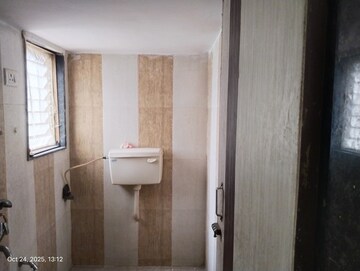 Bathroom in 2 BHK Apartment at Poonam Palash, Nalasopara West – for Sale