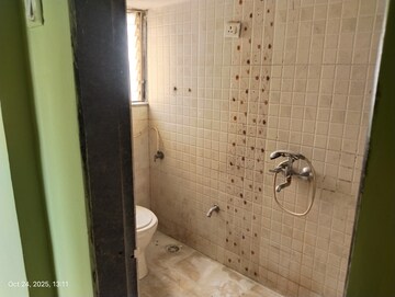 Bathroom in 2 BHK Apartment at Poonam Palash, Nalasopara West – for Sale