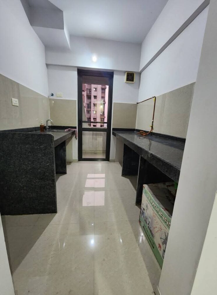 Kitchen, lodha-palava-city-lakeshore-greens 2 Bedroom 738 Sq.Ft. Apartment In Dombivli East Thane 9384000