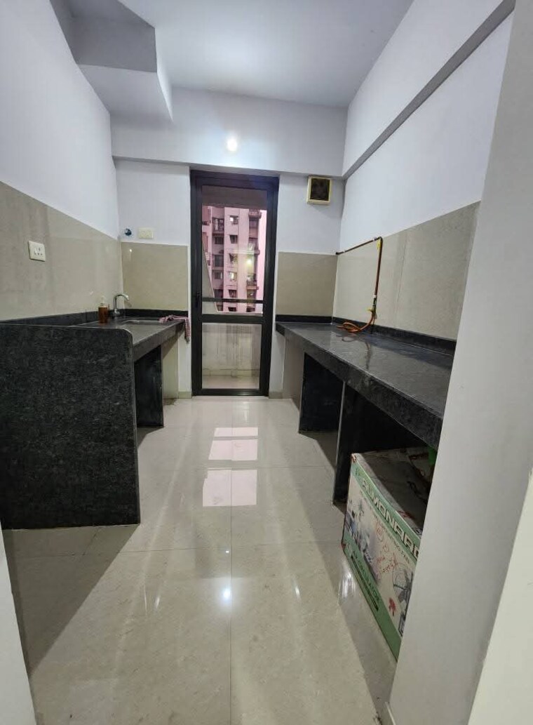 Kitchen, lodha-palava-city-lakeshore-greens 2 Bedroom 738 Sq.Ft. Apartment In Dombivli East Thane 9384000