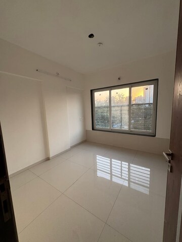 Room in 2 BHK Apartment at Aakar Padma Rekha CHS, Goregaon East – for Sale