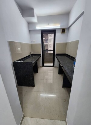 Kitchen in 1 BHK Apartment at Lodha Palava City Lakeshore Greens, Dombivli East – for Rent