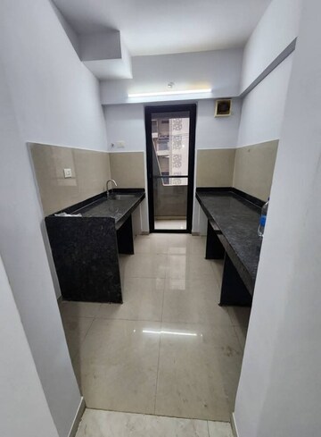 Kitchen in 1 BHK Apartment at Lodha Palava City Lakeshore Greens, Dombivli East – for Rent