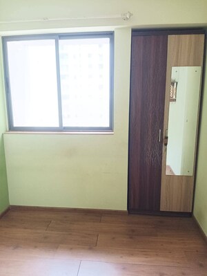 Bedroom in 1.5 BHK Apartment at Lodha Palava City Lakeshore Greens, Dombivli East – for Rent