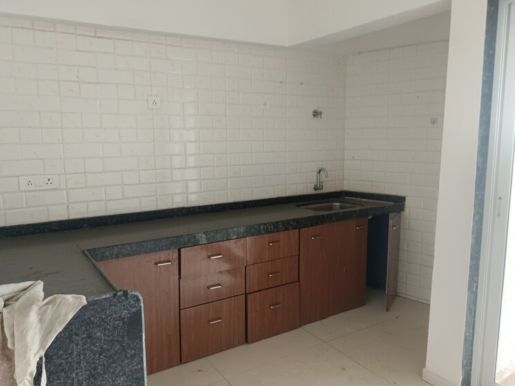 Kitchen, mutha-sai-nirvana 2 Bedroom 1085 Sq.Ft. Apartment In Shahad Thane 9384027