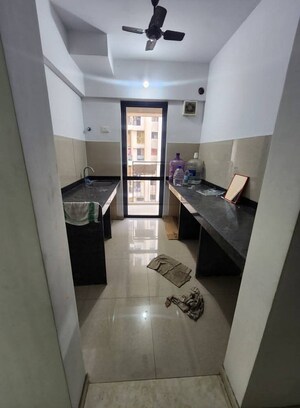 Kitchen in 1.5 BHK Apartment at Lodha Palava City Lakeshore Greens, Dombivli East – for Rent