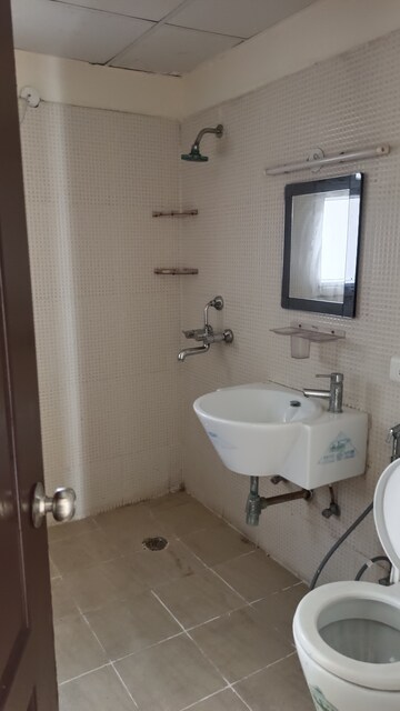 Bathroom in 3 BHK Apartment at Aditya Celebrity Homes, Sector 76 – for Rent