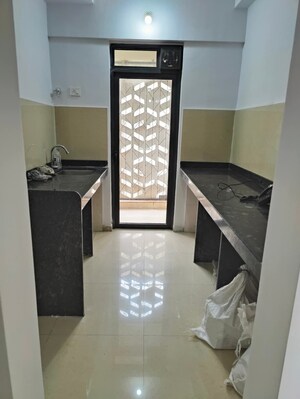 Kitchen in 2.5 BHK Apartment at Lodha Palava City Lakeshore Greens, Dombivli East – for Rent