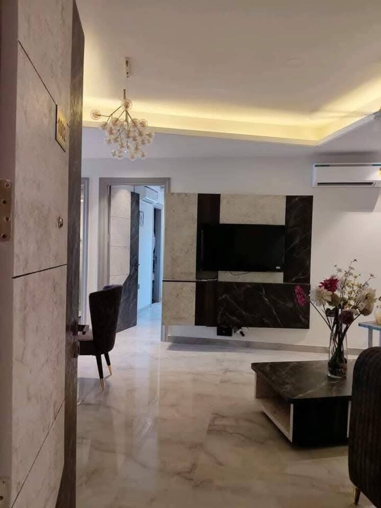 Living Room, ansal-celebrity-suites Studio 456 Sq.Ft. Apartment In Sector 2 Gurgaon 9384113