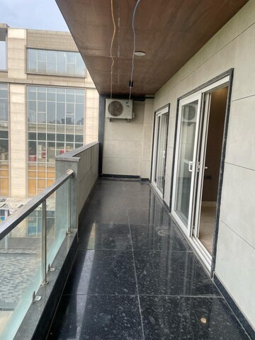 Balcony in Studio Apartment at Ansal Celebrity Suites, Sector 2 – for Rent