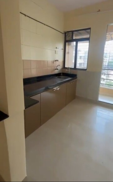 Kitchen in 2 BHK Apartment at Moreshwar Kamal, Kolshet – for Rent