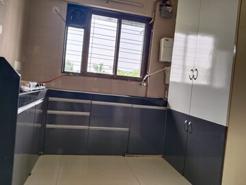 Kitchen in 2 BHK Apartment at Ruturang Society, Walvekar Nagar – for Rent