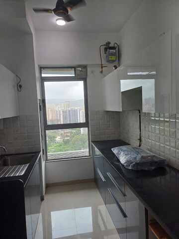 Kitchen in 1 BHK Apartment at Kalpataru Immensa, Kolshet Road – for Rent