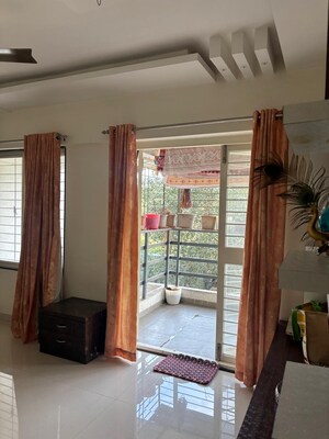 Living Room in 1 BHK Apartment at SD Neelayam CHS, Pashan – for Rent