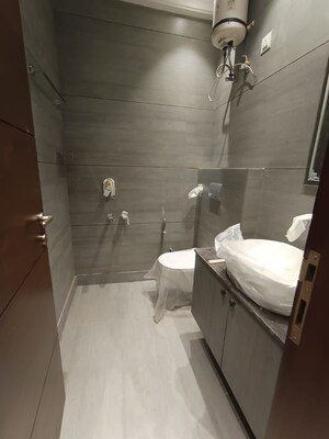 Bathroom in 3 BHK Apartment at Shubh Niketan Apartments, Paschim Vihar – for Rent