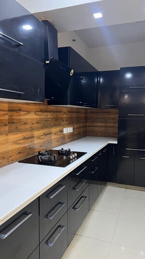 Kitchen in 2 BHK Apartment at Panchsheel Greens II, Sector 16 Greater Noida – for Rent