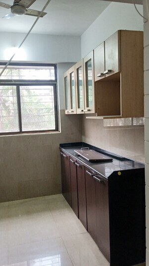 Kitchen in 2 BHK Apartment at Vijay Vilas Taurus Building 11 To 15, Ghodbunder Road – for Rent