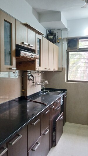 Kitchen in 2 BHK Apartment at Vijay Vilas Taurus Building 11 To 15, Ghodbunder Road – for Rent