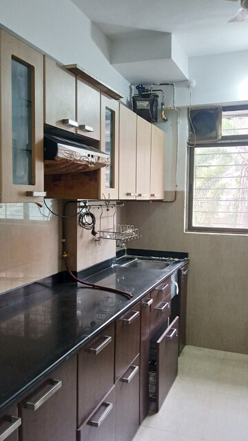 Kitchen in 2 BHK Apartment at Vijay Vilas Taurus Building 11 To 15, Ghodbunder Road – for Rent